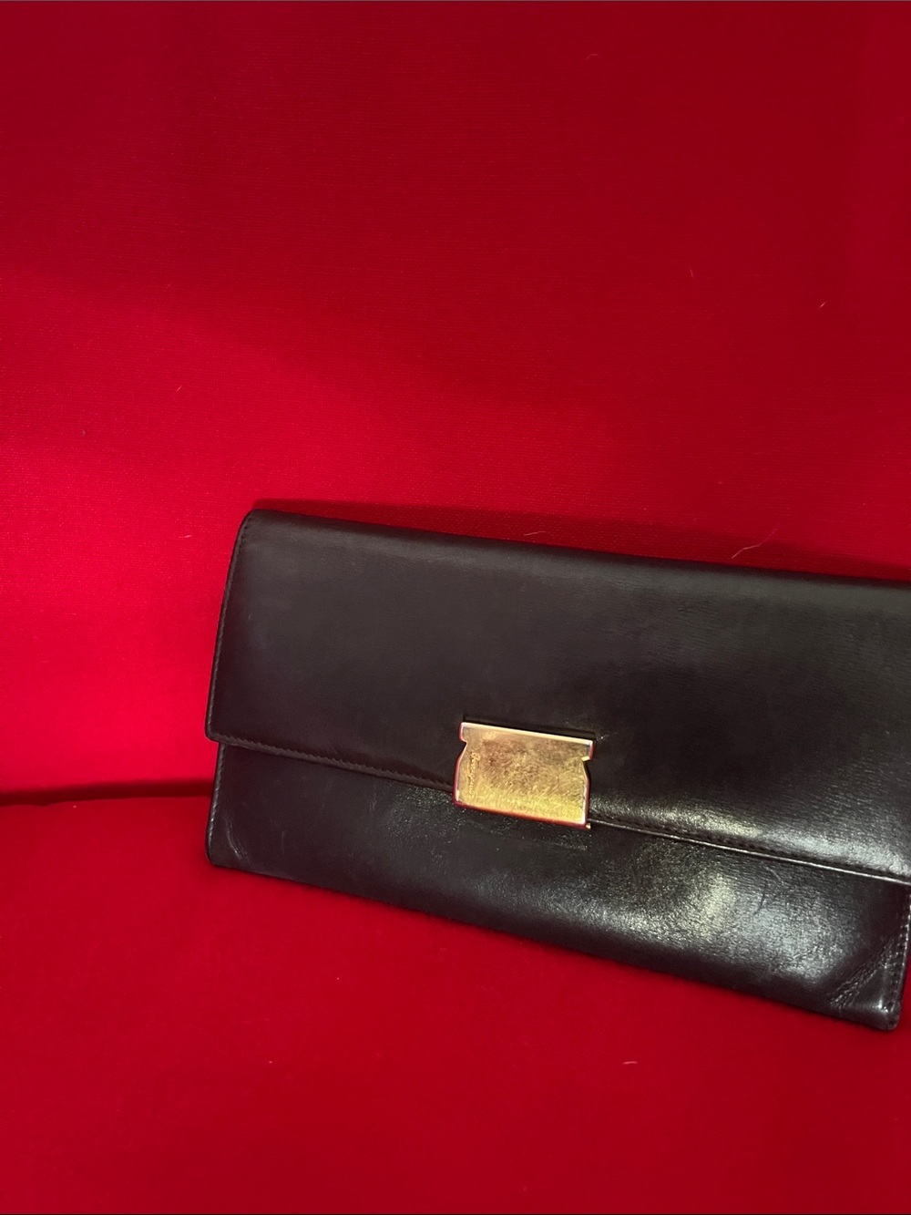 Salvatore Ferragamo Black Leather Clutch with Gold Hardware
